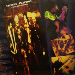 Buy In Action (Tenth Anniversary) (Live British Tour 85) (Vinyl)